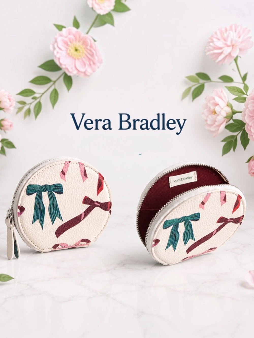 VERA BRADLEY Round Zip Pouch
in Rows of Bows Faux Leather NET MSRP: $39.00